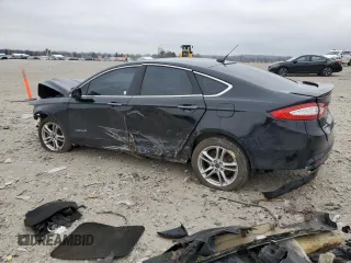 2016 Ford Fusion Titanium Hybrid z VIN 3FA6P0RU6GR139495, wystawiony jako Copart lot #52381235 z przebiegiem 138 534 mil mil oraz Czysty tytuł • Clean title. Historia ofert i sprzedaży dostępna na DreamBid. Obrazek 2.