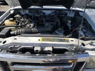 2006 Ford Ranger XL z VIN 1FTYR10D46PA05302, wystawiony jako Copart lot #58219405 z przebiegiem 180 967 mil mil oraz Szkoda całkowita • Salvage title. Historia ofert i sprzedaży dostępna na DreamBid. Obrazek 11.