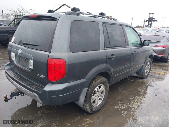2005 Honda Pilot EX-L with NAVI with VIN 2HKYF18745H567671, listed as a IAAI auction lot 41577393 with 178,182 mi miles. Bid and sale history available at carsss.com. Image 4.