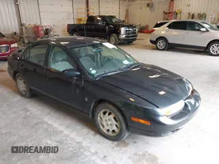 2000 Saturn SL z VIN 1G8ZK5272YZ268641, wystawiony jako IAAI lot #42384288 z przebiegiem 236 626 mil mil oraz . Historia ofert i sprzedaży dostępna na DreamBid. Obrazek 1.