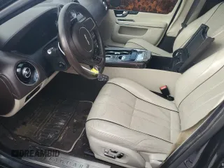 2013 Jaguar XJ with VIN SAJWA1C70D8V41578, listed as a Copart auction lot 89080585 with 76,063 mi miles and Salvage Title. Bid and sale history available at DreamBid. Image 7.