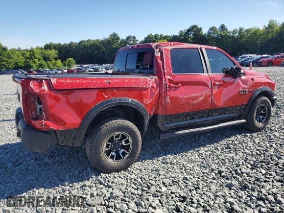 2017 Ram 1500 Rebel with VIN 1C6RR7YT2HS674131, listed as a Copart auction lot 61403835 with 24,675 mi miles and Salvage title. Bid and sale history available at DreamBid. Image 3.