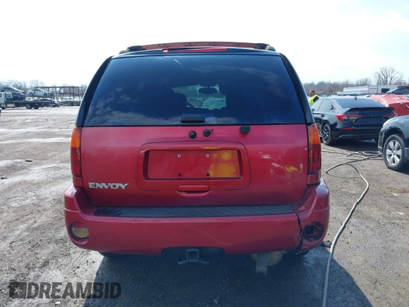 2005 GMC Envoy SLE with VIN 1GKDT13S252127604, listed as a IAAI auction lot 41898390 with 210,655 mi miles. Bid and sale history available at carsss.com. Image 16.