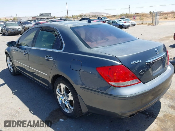 2005 Acura RL z VIN JH4KB16505C012679, wystawiony jako IAAI lot #41976411 z przebiegiem 103 342 mil mil oraz . Historia ofert i sprzedaży dostępna na DreamBid. Obrazek 3.