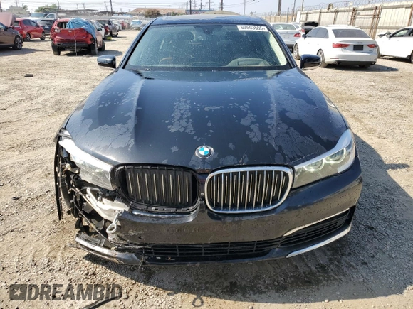2016 BMW 7 Series 740i z VIN WBA7E2C58GG738940, wystawiony jako Copart lot #60503595 z przebiegiem 99 654 mil mil oraz Szkoda całkowita • Salvage title. Historia ofert i sprzedaży dostępna na DreamBid. Obrazek 5.