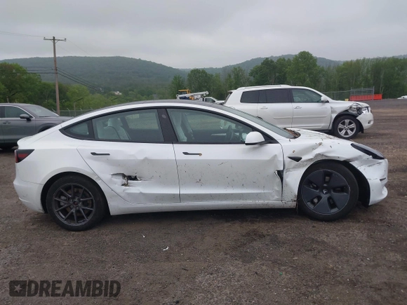 2023 Tesla Model 3 with VIN 5YJ3E1EA2PF626392, listed as a IAAI auction lot 42288413 with 25,605 mi miles and . Bid and sale history available at DreamBid. Image 13.