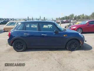 2015 MINI Hardtop 4 Door with VIN WMWXS5C50FT830060, listed as a IAAI auction lot 42744826 with 99,813 mi miles and . Bid and sale history available at DreamBid. Image 13.