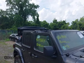 2020 Jeep Wrangler Unlimited Sport S with VIN 1C4HJXDN7LW113735, listed as a IAAI auction lot 42639884 with 48,736 mi miles and . Bid and sale history available at DreamBid. Image 6.