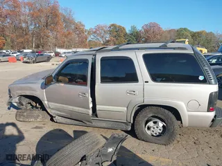 2005 Chevrolet Tahoe LT with VIN 1GNEC13T15R218984, listed as a IAAI auction lot 41017590 with 248,781 mi miles. Bid and sale history available at carsss.com. Image 14.