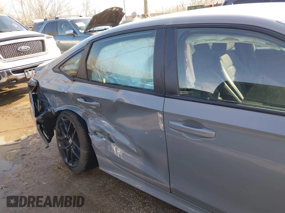 2025 Honda Civic Sport with VIN 2HGFE2F55SH529311, listed as a IAAI auction lot 41898987 with 2,873 mi miles and . Bid and sale history available at DreamBid. Image 6.