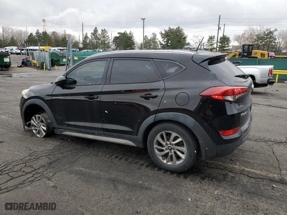 2017 Hyundai Tucson SE with VIN KM8J33A4XHU460779, listed as a Copart auction lot 52042115 with 96,459 mi miles and Salvage Title. Bid and sale history available at carsss.com. Image 2.
