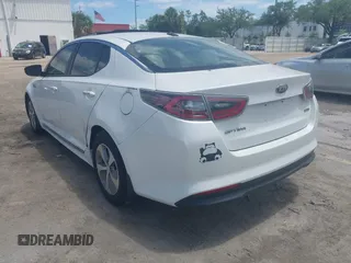 2014 Kia Optima Hybrid LX with VIN KNAGM4AD7E5075376, listed as a IAAI auction lot 42179468 with 131,920 mi miles. Bid and sale history available at carsss.com. Image 3.