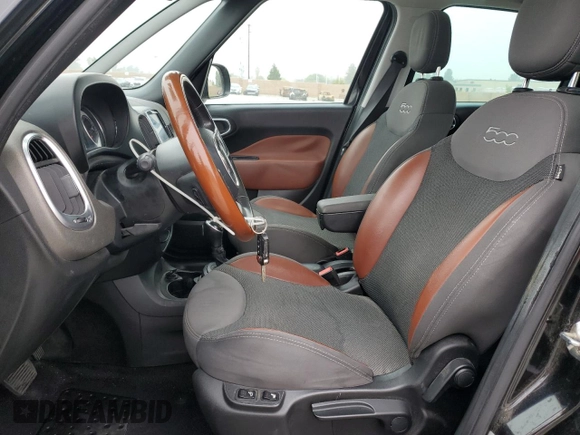 2014 FIAT 500L Trekking with VIN ZFBCFADH1EZ007143, listed as a Copart auction lot 52030065 with 90,894 mi miles and Salvage title. Bid and sale history available at DreamBid. Image 7.
