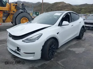 2020 Tesla Model Y Long Range with VIN 5YJYGDEE2LF022484, listed as a IAAI auction lot 41798662 with 108,978 mi miles and . Bid and sale history available at DreamBid. Image 19.
