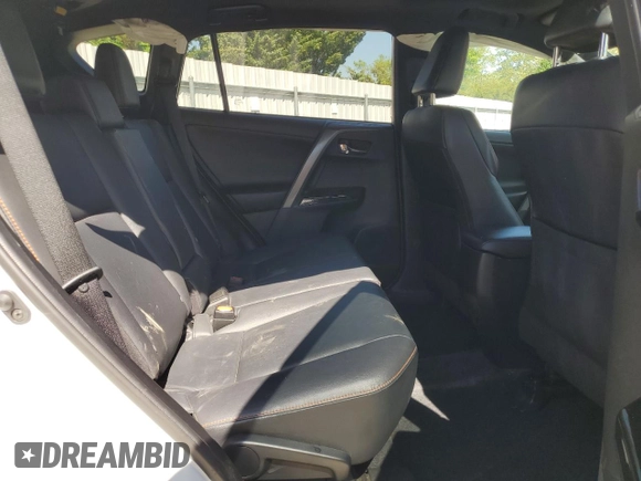 2018 Toyota RAV4 SE with VIN 2T3JFREV9JW801731, listed as a Copart auction lot 55866485 with 64,043 mi miles and Salvage title. Bid and sale history available at DreamBid. Image 11.