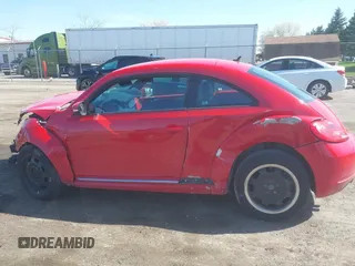 2012 Volkswagen Beetle 2.5L w/Sound/Nav PZEV with VIN 3VWJP7AT6CM620285, listed as a IAAI auction lot 42094101 with 125,737 mi miles and . Bid and sale history available at DreamBid. Image 14.