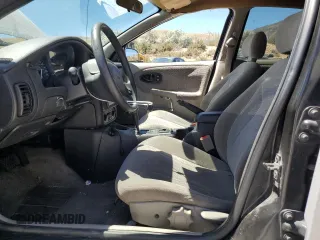 2001 Saturn SL with VIN 1G8ZK52731Z237050, listed as a Copart auction lot 60977394 with Not provided miles and Salvage title. Bid and sale history available at DreamBid. Image 7.
