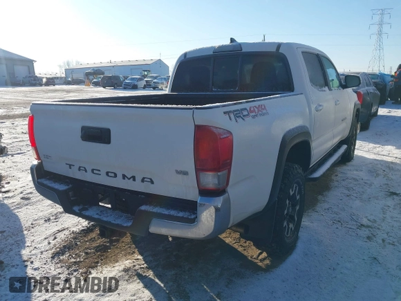 2016 Toyota Tacoma SR with VIN 3TMCZ5AN1GM033770, listed as a IAAI auction lot 41418290 with 122,000 mi miles. Bid and sale history available at carsss.com. Image 4.