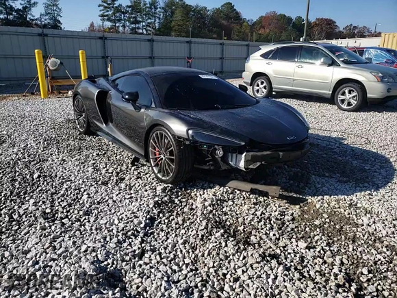 2021 McLaren GT z VIN SBM22GCA8MW001374, wystawiony jako Copart lot #82147064 z przebiegiem 32 562 mil mil oraz Nie do naprawy. Historia ofert i sprzedaży dostępna na DreamBid. Obrazek 14.