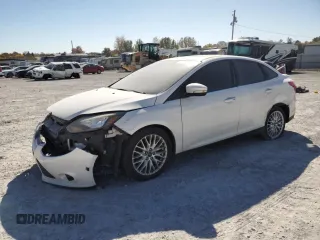 2014 Ford Focus Titanium with VIN 1FADP3J20EL122447, listed as a Copart auction lot 75774344 with 188,413 mi miles and Salvage Title. Bid and sale history available at carsss.com. Image 1.