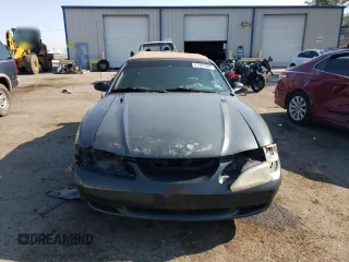 1998 Ford Mustang with VIN 1FAFP444XWF176396, listed as a Copart auction lot 61322984 with 86,168 mi miles and Salvage title. Bid and sale history available at DreamBid. Image 5.
