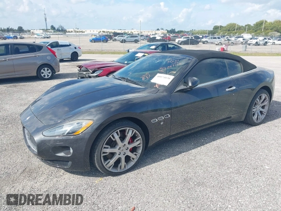 2013 Maserati GranTurismo Convertible Sport with VIN ZAM45MMA2D0069786, listed as a IAAI auction lot 40874830 with 37,312 mi miles. Bid and sale history available at carsss.com. Image 2.
