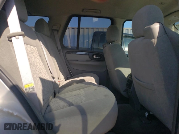 2005 GMC Envoy SLE z VIN 1GKDT13S552122428, wystawiony jako Copart lot #68651224 z przebiegiem 111 931 mil mil oraz Szkody całkowita. Historia ofert i sprzedaży dostępna na DreamBid. Obrazek 11.