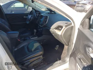 2016 Jeep Cherokee Limited with VIN 1C4PJLDB8GW256788, listed as a IAAI auction lot 41657339 with 104,630 mi miles. Bid and sale history available at carsss.com. Image 5.