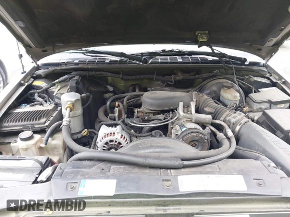 1999 GMC Jimmy SLE z VIN 1GKCS13W0X2512048, wystawiony jako IAAI lot #42364175 z przebiegiem 195 301 mil mil oraz . Historia ofert i sprzedaży dostępna na DreamBid. Obrazek 10.