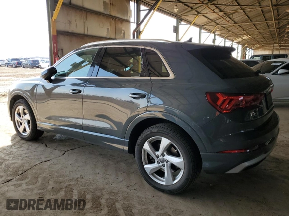 2020 Audi Q3 Premium with VIN WA1AECF34L1034797, listed as a Copart auction lot 51096385 with 74,192 mi miles and Salvage title. Bid and sale history available at DreamBid. Image 2.