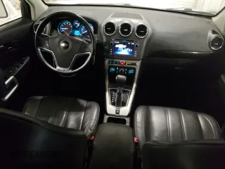 2014 Chevrolet Captiva Sport LT with VIN 3GNAL3EK4ES661268, listed as a Copart auction lot 74895224 with 128,513 mi miles and Salvage Title. Bid and sale history available at DreamBid. Image 8.
