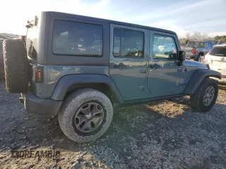 2015 Jeep Wrangler Unlimited Rubicon with VIN 1C4BJWFG7FL732694, listed as a Copart auction lot 42977435 with 128,759 mi miles and Salvage Title. Bid and sale history available at carsss.com. Image 3.