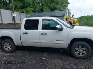 2012 GMC Sierra 1500 SLE z VIN 3GTP2VE71CG229654, wystawiony jako IAAI lot #42461209 z przebiegiem 180 378 mil mil oraz . Historia ofert i sprzedaży dostępna na DreamBid. Obrazek 13.