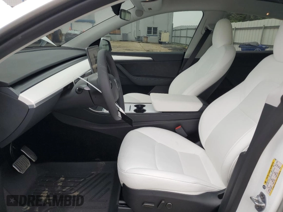 2024 Tesla Model Y Long Range with VIN 7SAYGDEE2RA329081, listed as a Copart auction lot 57254265 with 2,325 mi miles and Salvage title. Bid and sale history available at DreamBid. Image 7.