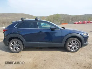 2021 Mazda CX-30 Premium with VIN 3MVDMBDM4MM238367, listed as a IAAI auction lot 42124335 with 31,120 mi miles and . Bid and sale history available at DreamBid. Image 13.