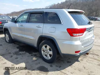 2013 Jeep Grand Cherokee Laredo with VIN 1C4RJFAG5DC634685, listed as a IAAI auction lot 41792147 with 260,594 mi miles. Bid and sale history available at carsss.com. Image 3.