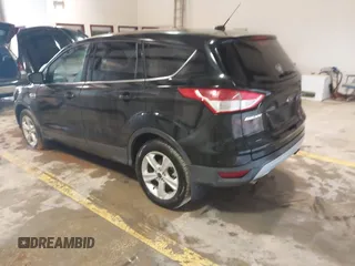 2014 Ford Escape SE z VIN 1FMCU9GX6EUB69007, wystawiony jako IAAI lot #41710065 z przebiegiem 113 080 mil mil oraz . Historia ofert i sprzedaży dostępna na DreamBid. Obrazek 3.