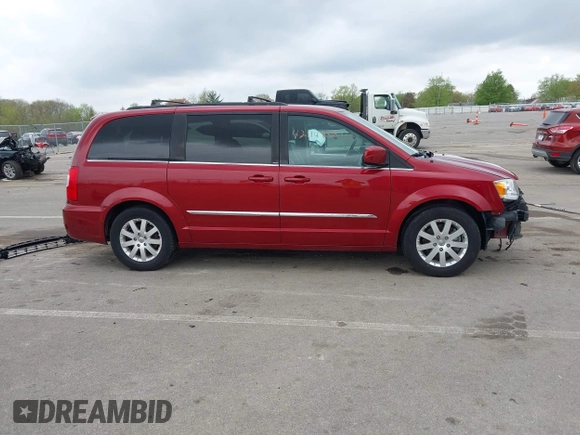 2013 Chrysler Town & Country Touring z VIN 2C4RC1BG2DR777712, wystawiony jako IAAI lot #42114838 z przebiegiem 139 103 mil mil oraz . Historia ofert i sprzedaży dostępna na DreamBid. Obrazek 14.