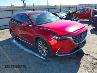 2021 Mazda CX-9 Signature with VIN JM3TCBEY7M0529957, listed as a IAAI auction lot 41388923 with 69,919 mi miles. Bid and sale history available at carsss.com. Image 1.