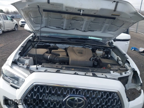2019 Toyota Tacoma SR z VIN 3TMCZ5AN9KM284092, wystawiony jako IAAI lot #41774851 z przebiegiem 100 031 mil mil oraz . Historia ofert i sprzedaży dostępna na DreamBid. Obrazek 10.