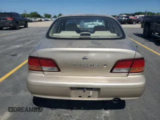 1997 Nissan Maxima GXE с VIN JN1CA21D5VT811907, выставлен на аукционе Copart как лот 60270405 с пробегом 71 723 миль миль и Чистый • Clean title. История ставок и продаж доступна на DreamBid. Изображение 6.