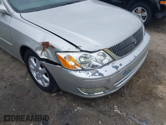 2002 Toyota Avalon XL with VIN 4T1BF28B82U240087, listed as a IAAI auction lot 41699355 with 263,253 mi miles. Bid and sale history available at carsss.com. Image 6.