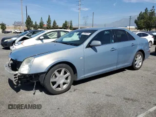 2007 Cadillac STS z VIN 1G6DW677370174339, wystawiony jako Copart lot #57996815 z przebiegiem 136 243 mil mil oraz Szkody całkowita. Historia ofert i sprzedaży dostępna na DreamBid. Obrazek 1.