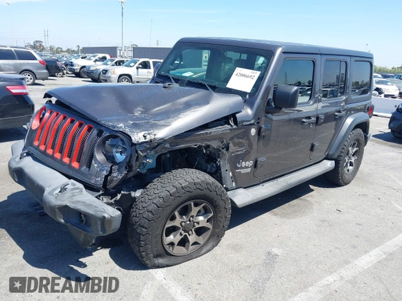 2020 Jeep Wrangler Unlimited Freedom z VIN 1C4HJXDG8LW338702, wystawiony jako IAAI lot #42006692 z przebiegiem 48 389 mil mil oraz . Historia ofert i sprzedaży dostępna na DreamBid. Obrazek 2.