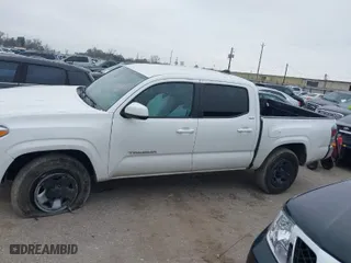 2023 Toyota Tacoma 2WD SR with VIN 3TYAX5GN0PT068597, listed as a IAAI auction lot 41603109 with 33,279 mi miles. Bid and sale history available at carsss.com. Image 13.
