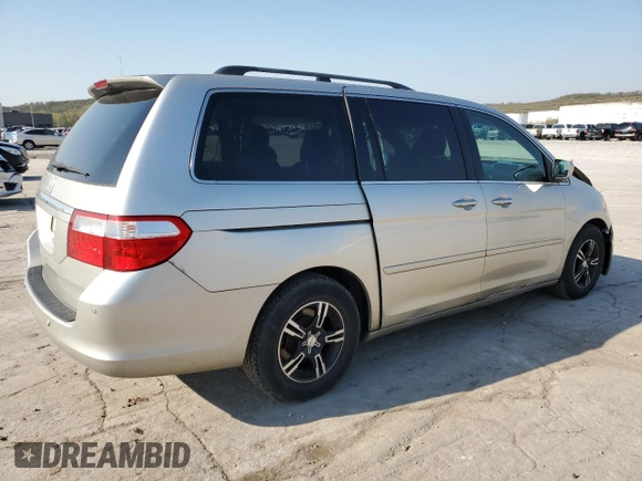 2007 Honda Odyssey Touring with VIN 5FNRL38817B099305, listed as a Copart auction lot 52005335 with 215,799 mi miles and Salvage Title. Bid and sale history available at carsss.com. Image 3.