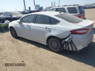2015 Ford Fusion Titanium with VIN 3FA6P0K90FR282320, listed as a IAAI auction lot 41777384 with 154,204 mi miles. Bid and sale history available at carsss.com. Image 3.