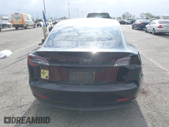 2019 Tesla Model 3 Mid Range with VIN 5YJ3E1EA3KF415601, listed as a IAAI auction lot 42125393 with 150,220 mi miles and . Bid and sale history available at carsss.com. Image 20.