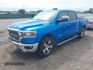 2021 Ram 1500 Laramie with VIN 1C6SRFJT1MN774879, listed as a IAAI auction lot 42242318 with 51,971 mi miles and . Bid and sale history available at DreamBid. Image 18.