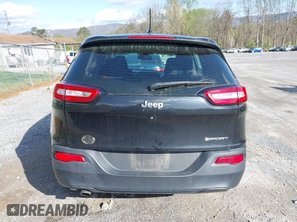 2014 Jeep Cherokee Sport with VIN 1C4PJLAB4EW110051, listed as a IAAI auction lot 41961698 with 153,570 mi miles and . Bid and sale history available at DreamBid. Image 16.